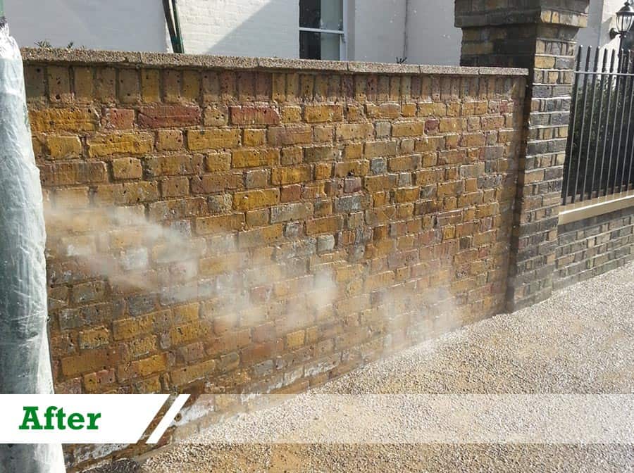 Paint removal from brick wall completed by UK Performance Restoration, London UK.