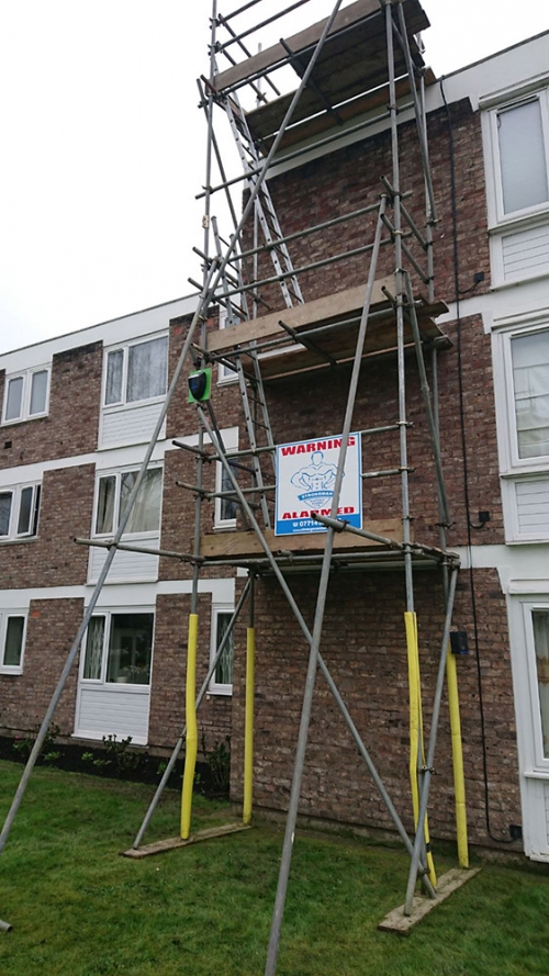 Scaffolding towers on residential estate