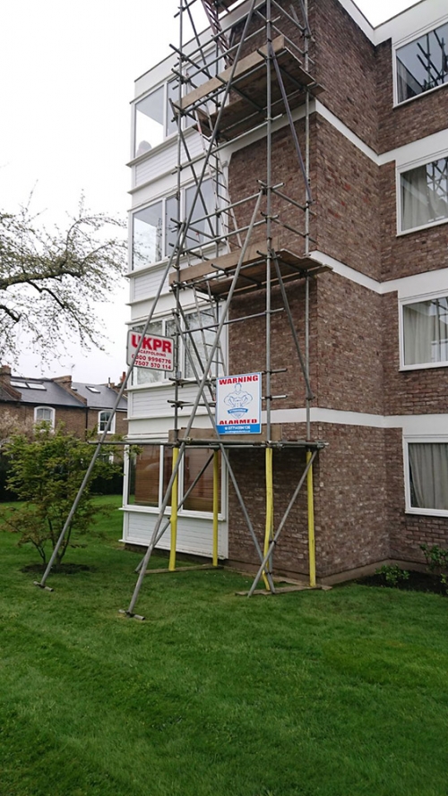 Scaffolding towers on residential estate