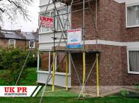 Three scaffolding towers on residential estate
