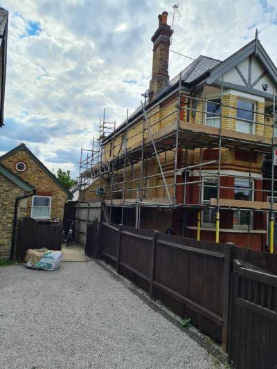Brick cleaning big house in Bromley